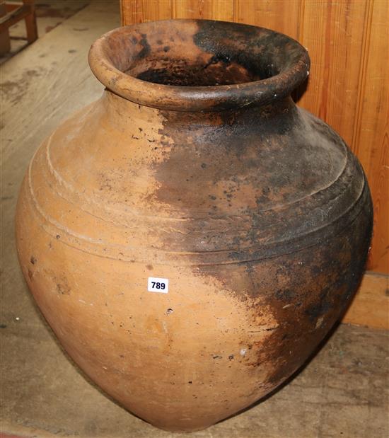 A large terracotta amphora